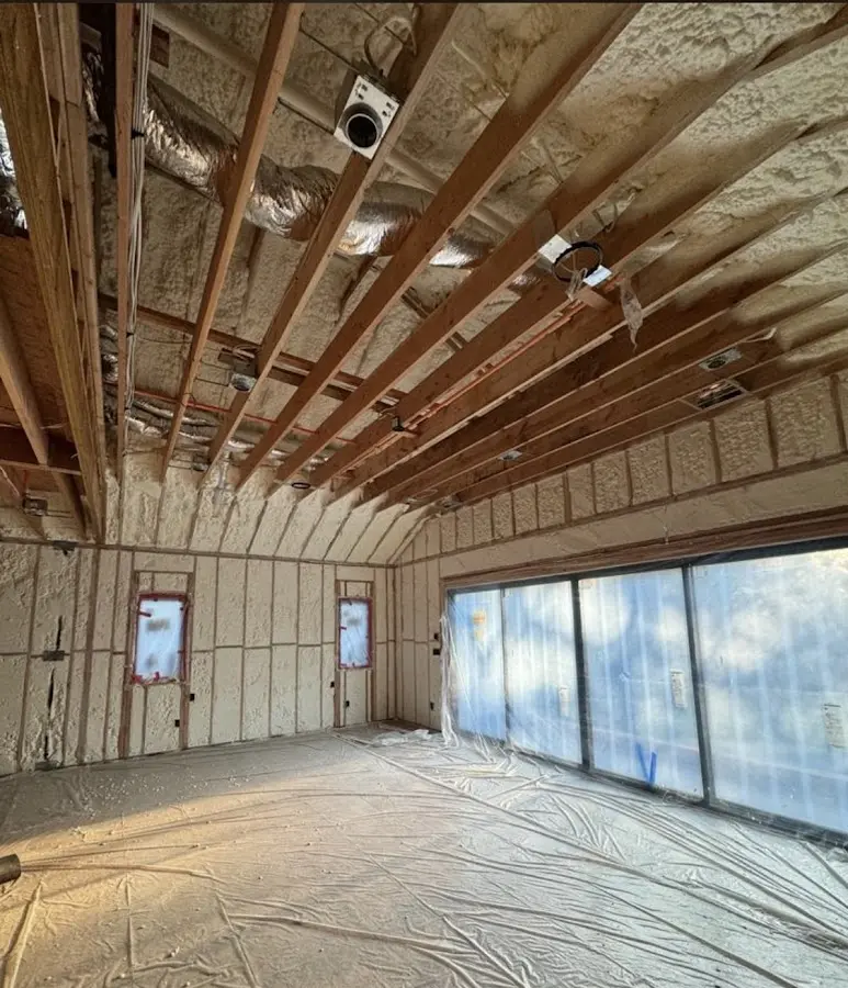 Interior walls and ceiling insulated with spray foam during new construction in Shoreview